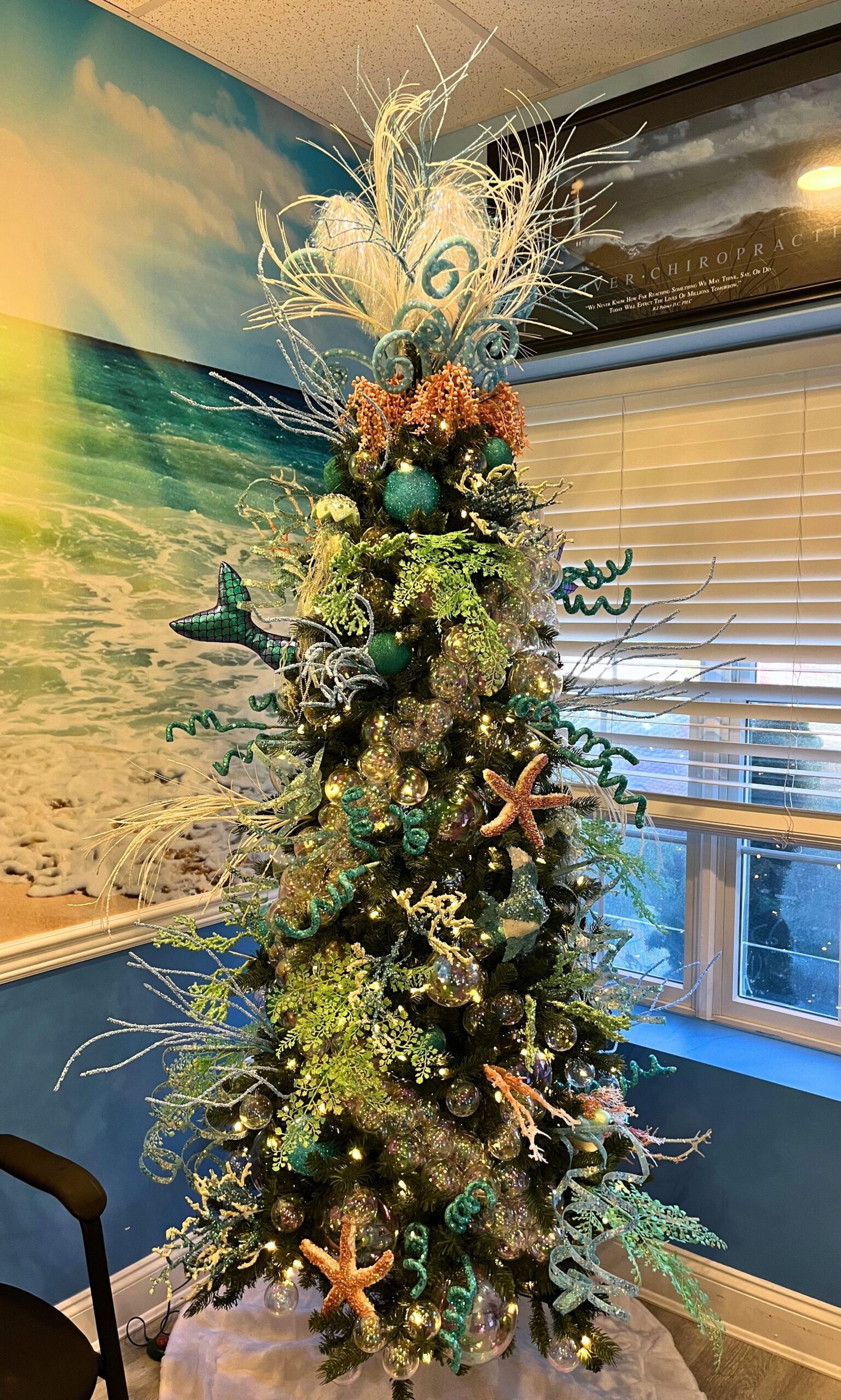 Close-up of ocean-inspired holiday tree styling at Leon Chiropractic