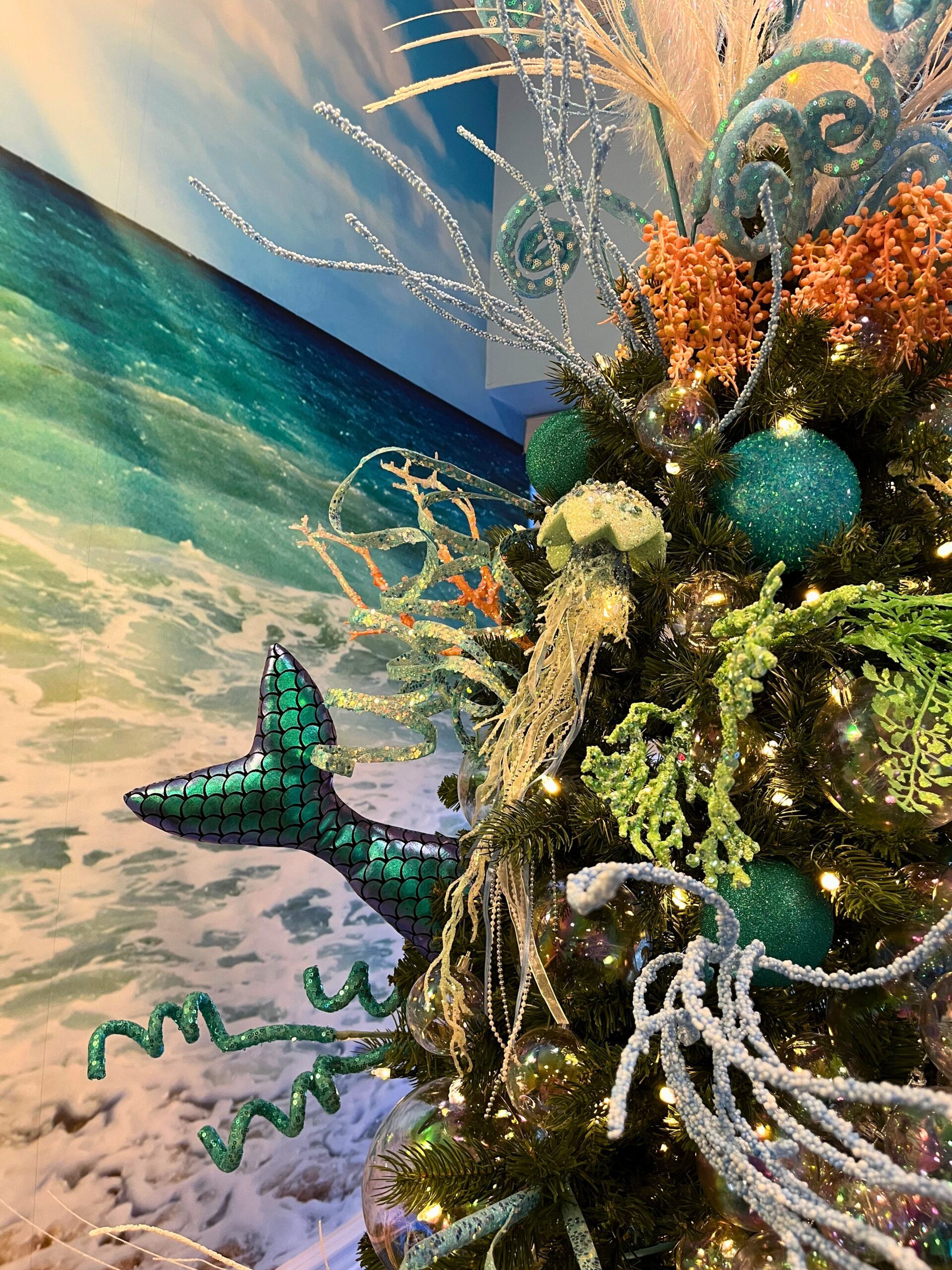 Aquatic-themed holiday tree detail with underwater-inspired ornaments at Leon Chiropractic