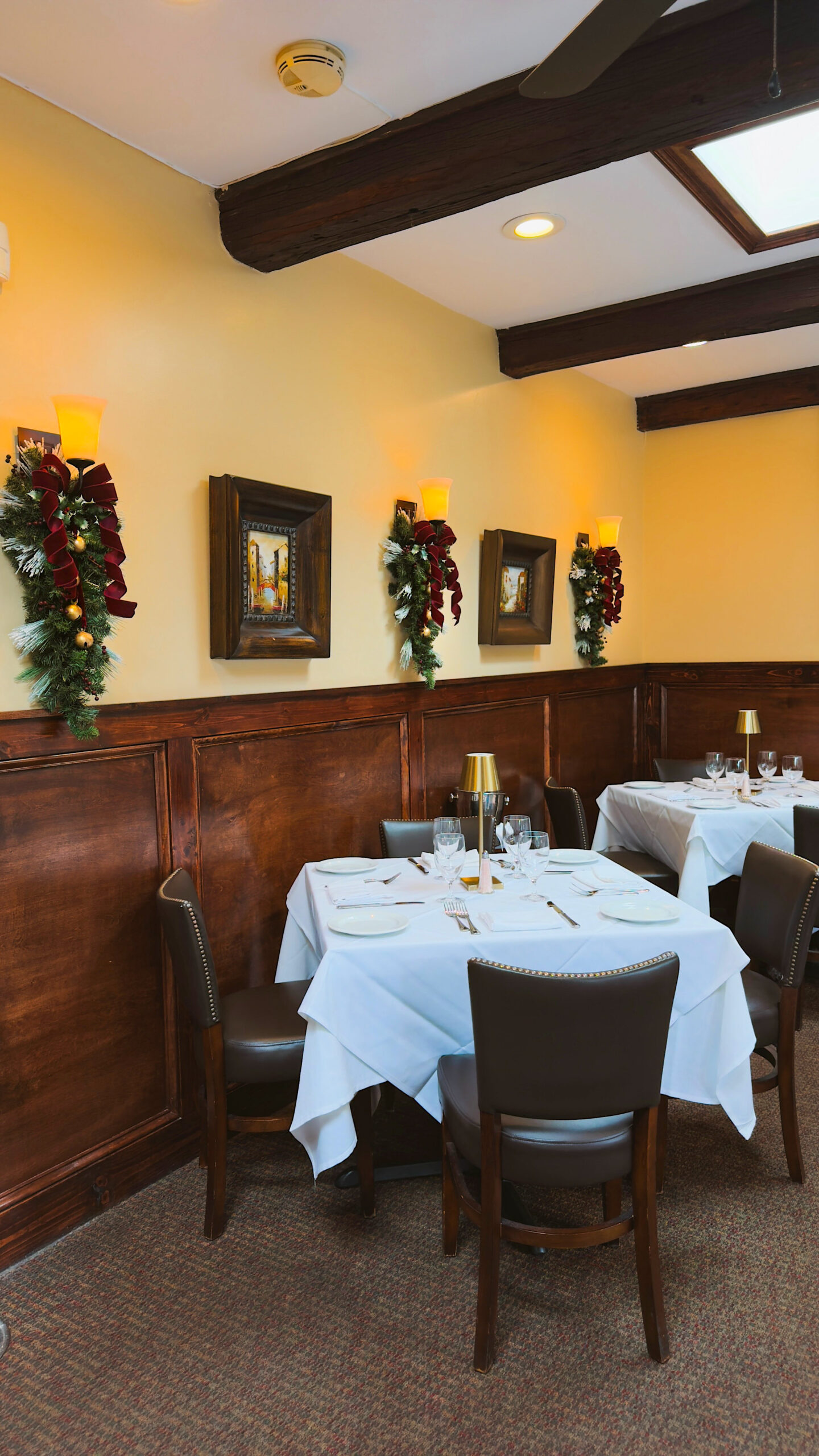 Holiday garland swag installation at Da Noi Restaurant